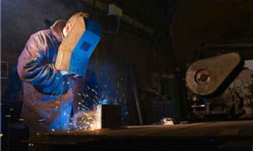 man welding in canberra
